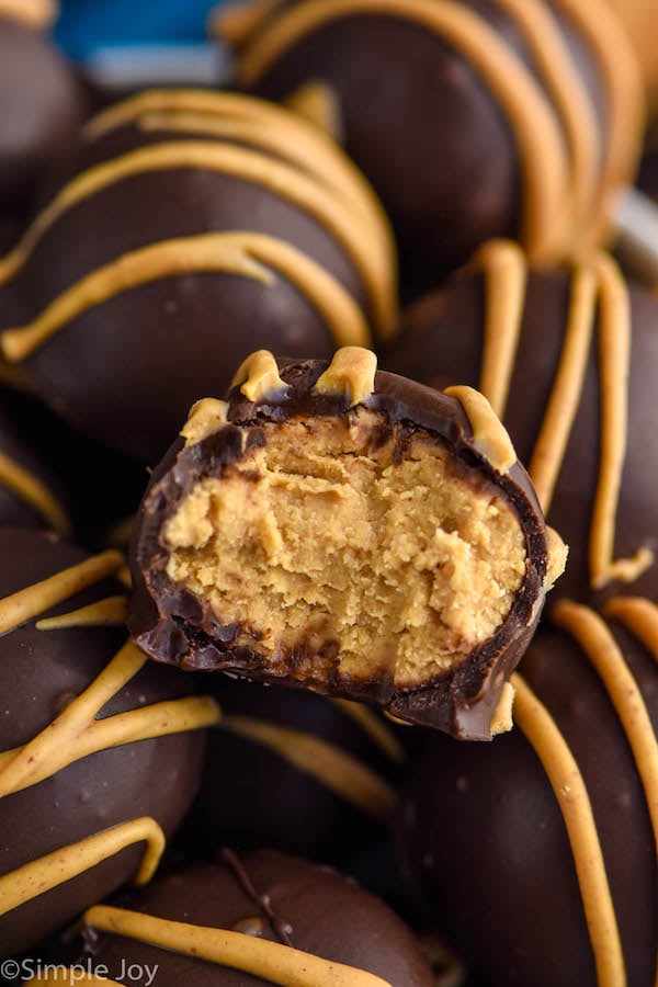 Photo of Peanut Butter Balls with a bite taken out.