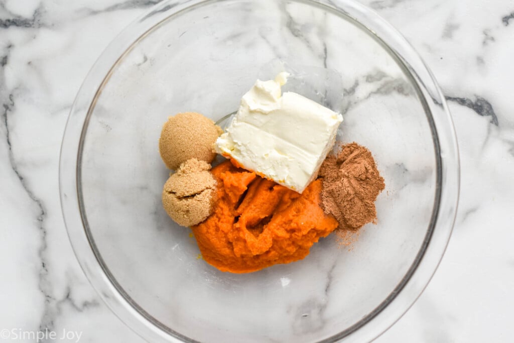 Overhead photo of ingredients for Pumpkin Cheesecake Braid in a bowl.