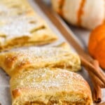 Overhead photo of Pumpkin Cheesecake Braid cut into pieces. - 21