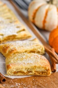 Overhead photo of Pumpkin Cheesecake Braid cut into pieces.