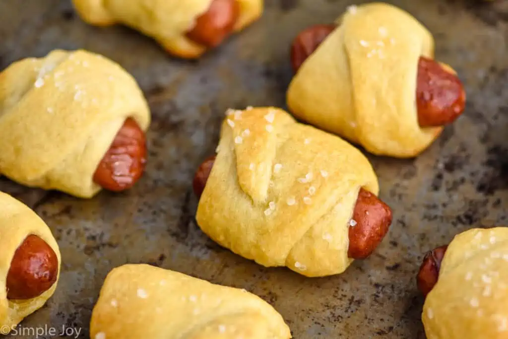 pigs in a blanket on a baking sheet
