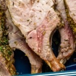 Pinterst photo of Roast Pork Loin with an overhead close up photo of cooked pork loin. Says 'the best roast pork simplejoy.com'