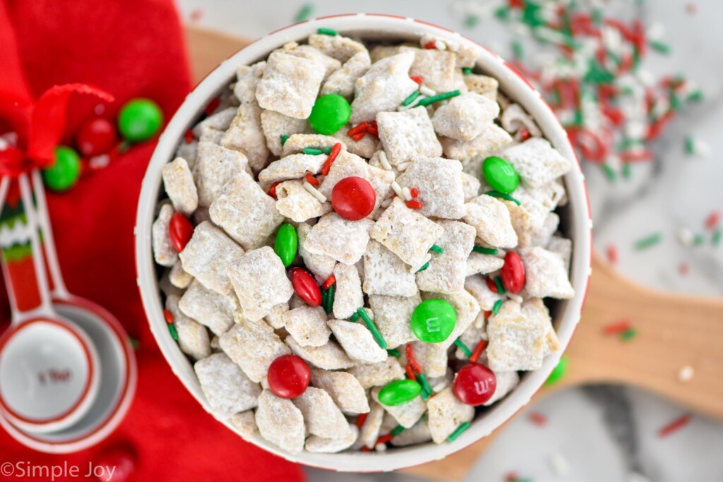 overhead of bowl of Christmas puppy chow