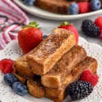 plate of french toast sticks with fresh berries - 12