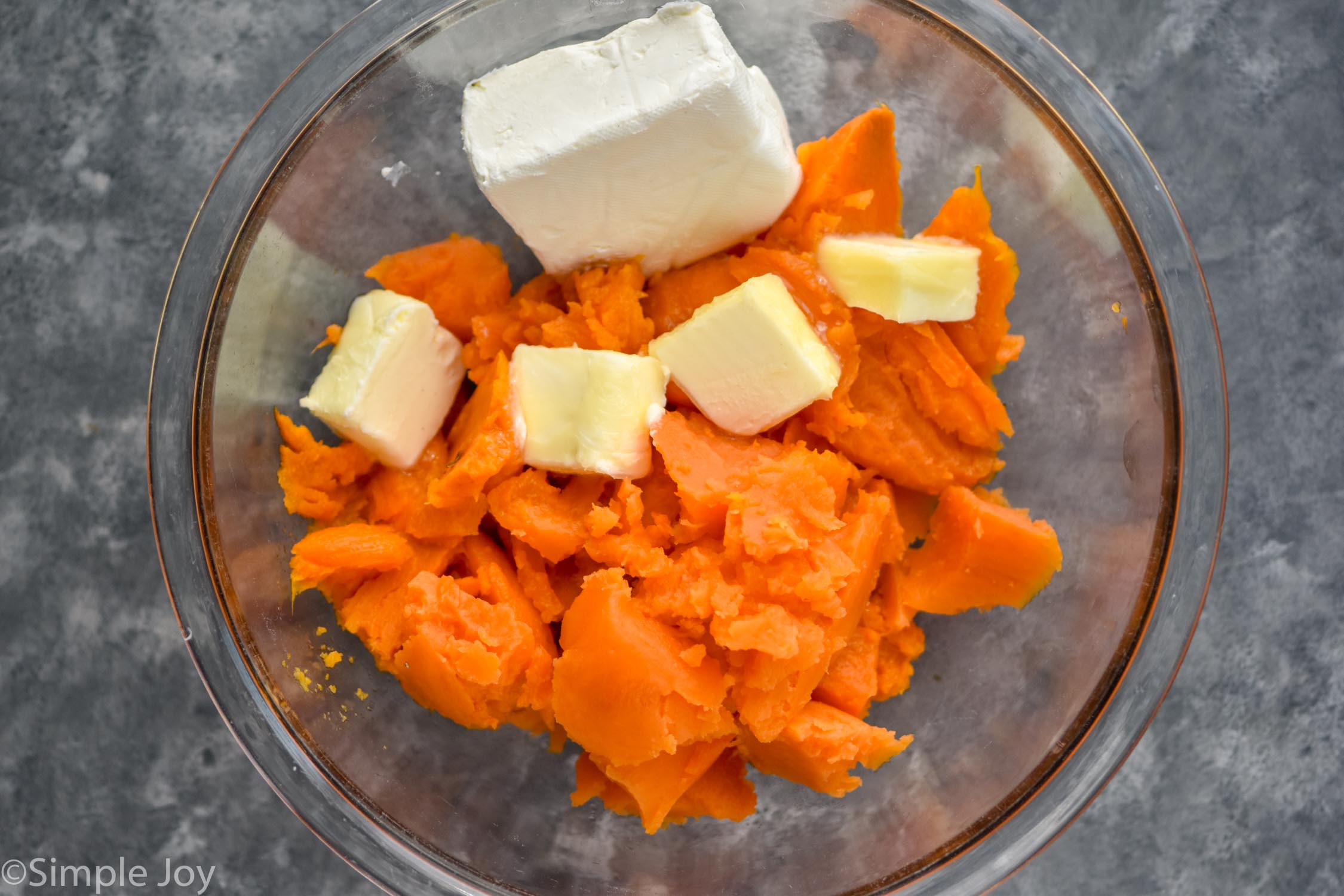 Overhead photo of mixing bowl of ingredients for Twice Baked Sweet Potatoes recipe.