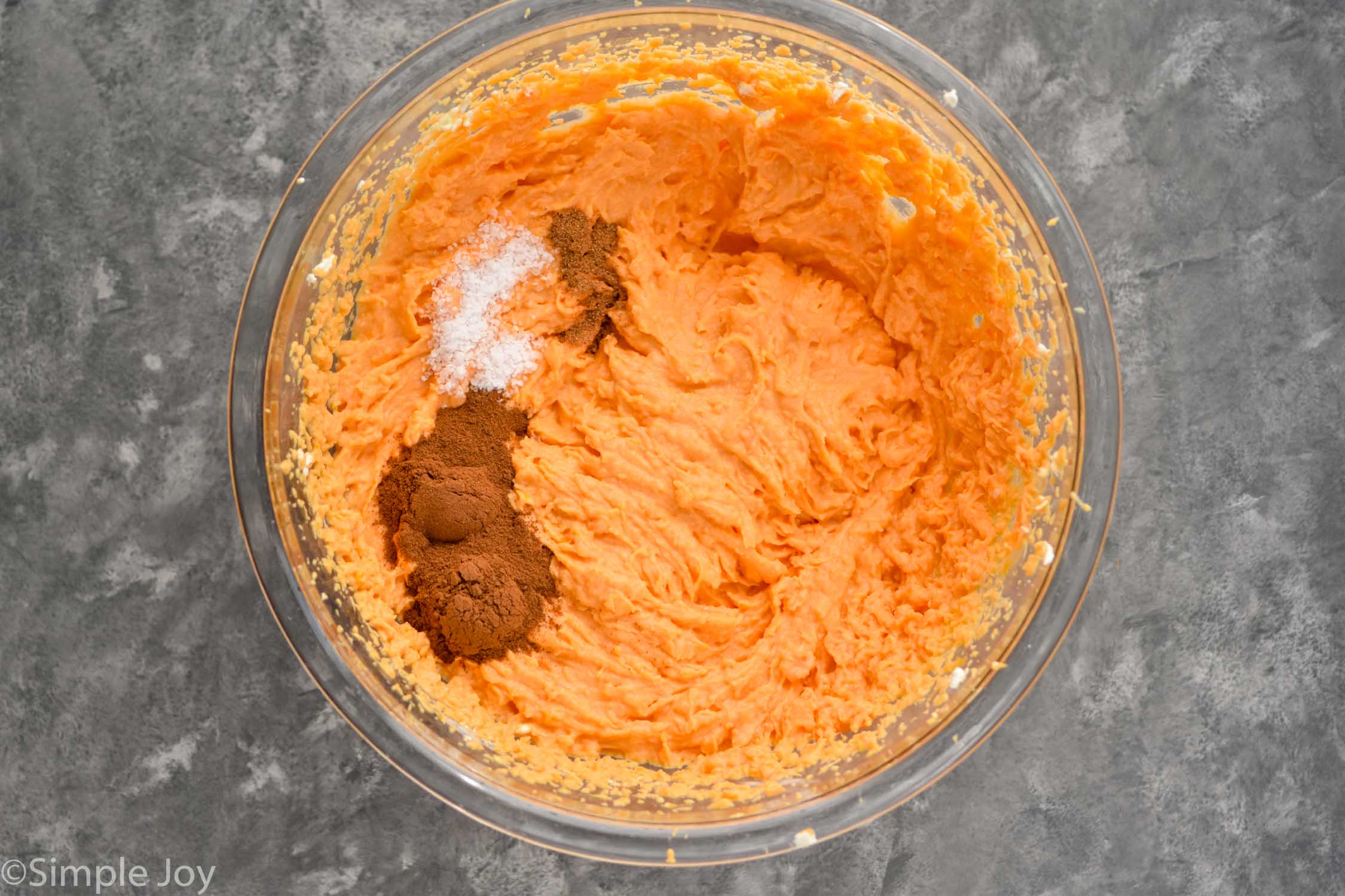 Overhead photo of mixing bowl of ingredients for Twice Baked Sweet Potatoes recipe.