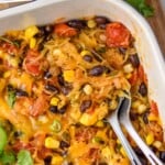 Pinterest graphic of Spaghetti Squash Casserole. Text says, "Vegetarian Casserole Recipe simplejoy.com." Image is overhead photo of a baking dish of Spaghetti Squash Casserole with spoons for serving.
