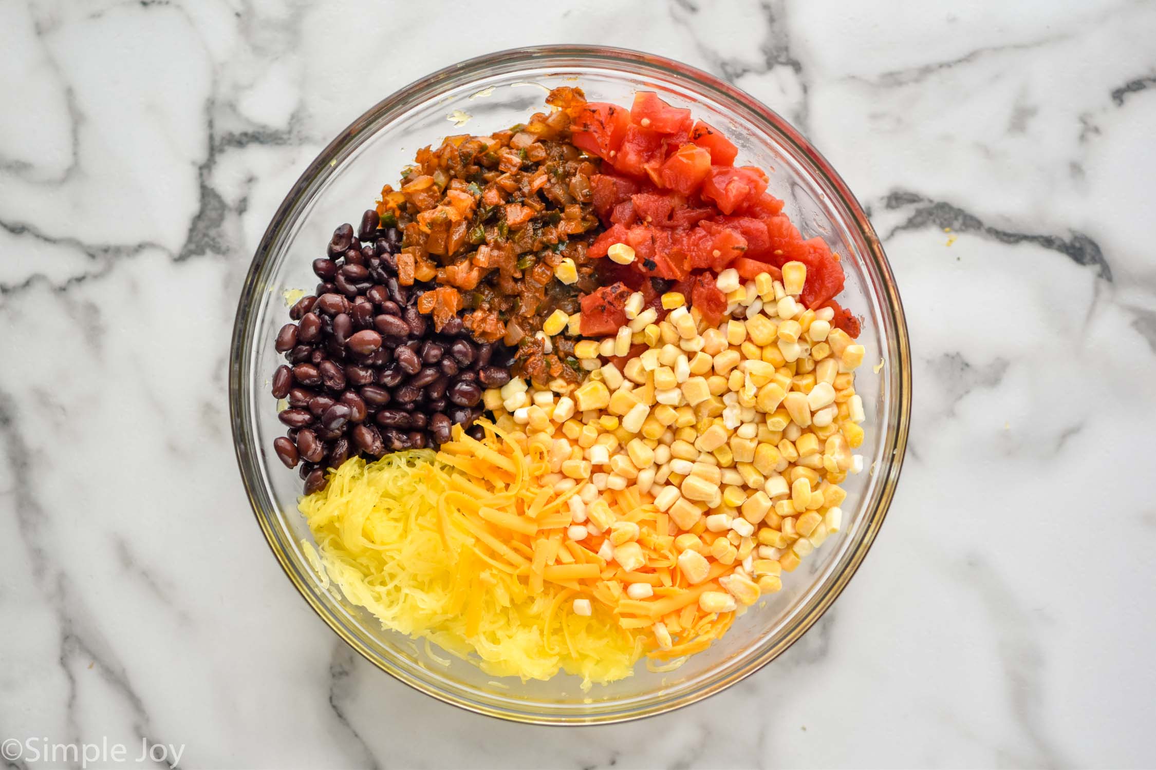Overhead photo of mixing bowl of ingredients for Spaghetti Squash Casserole