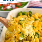 Pinterest graphic for Chicken Broccoli Noodle Casserole recipe. Text says, "Comforting Chicken and Broccoli Casserole simplejoy.com." Image is close up photo of a spoon of Chicken Broccoli Noodle Casserole scooping out of baking dish.