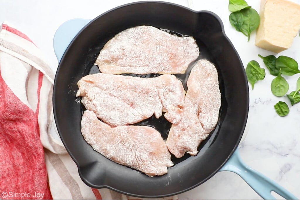 overhead of chicken cutlets in a pan - 5
