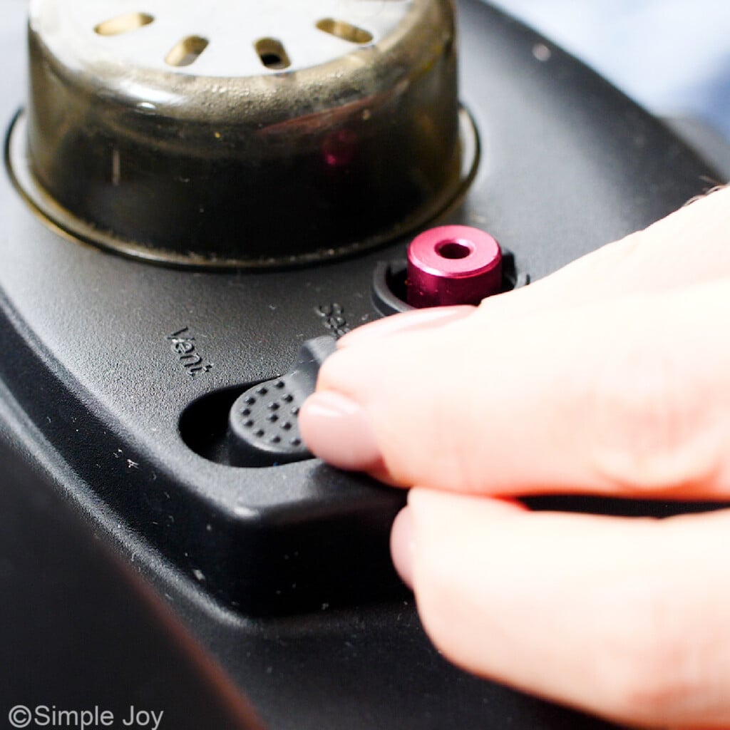 an instant pot set to sealing - 7