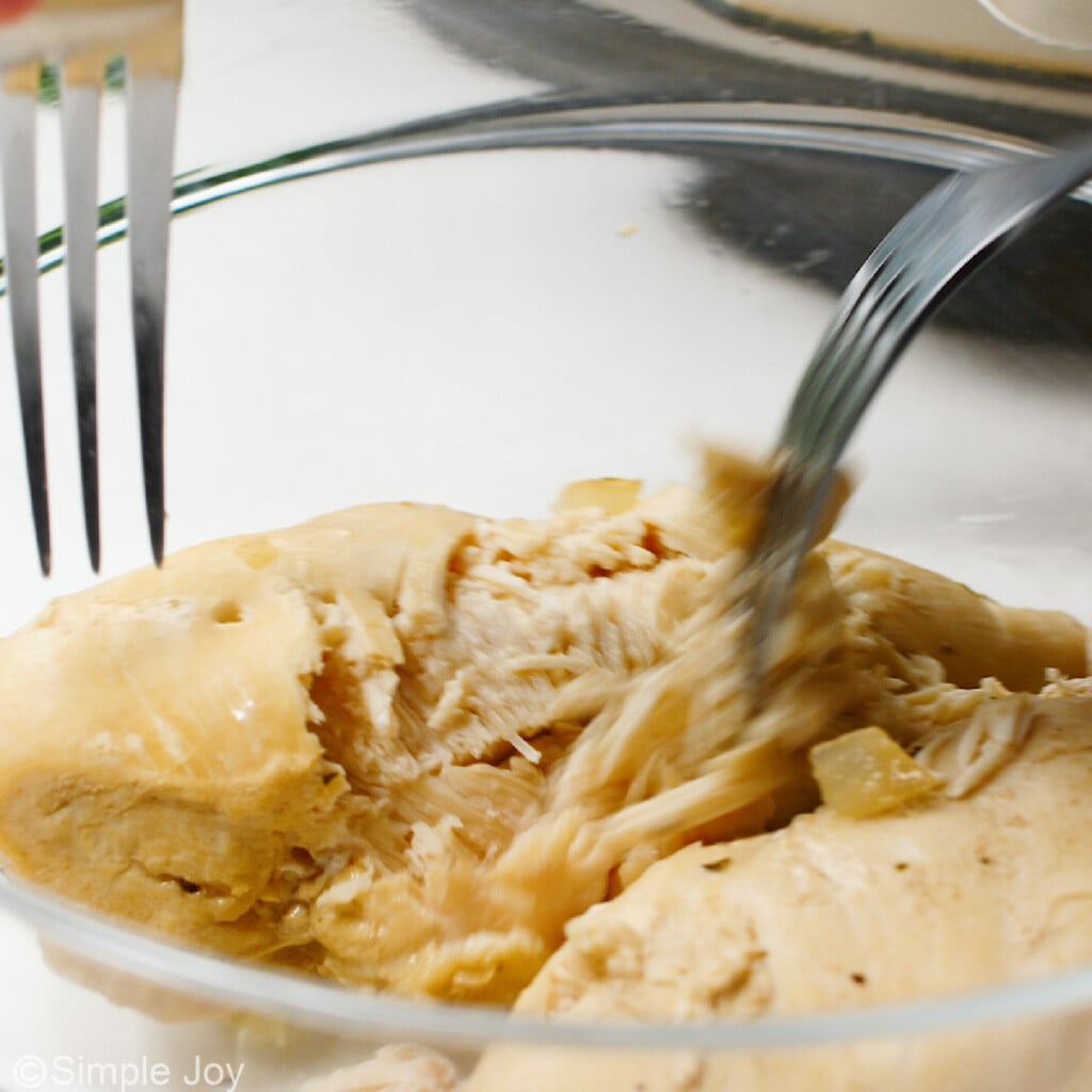shredding chicken breast with forks - 8
