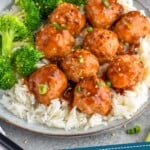 Pinterest graphic for Teriyaki Meatballs recipe. Image is overhead photo of Teriyaki Meatballs served with rice and broccoli. Text says, "35 minute Teriyaki Meatballs simplejoy.com."