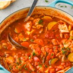 Pinterest graphic for Vegetable Soup recipe. Text says, "Homemade Vegetable Soup simplejoy.com." Image is overhead photo of a pot of Vegetable Soup with a ladle for serving.