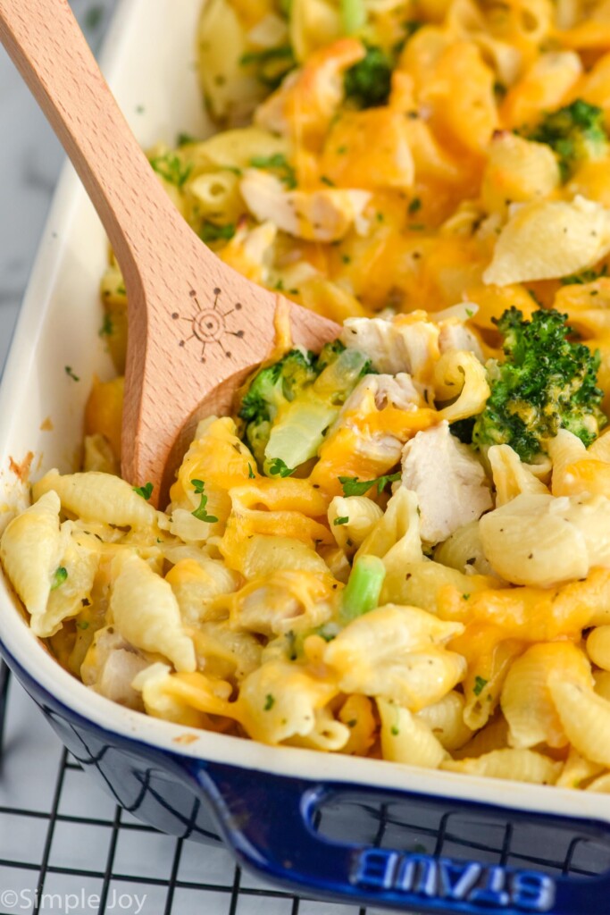 Close up photo of Chicken Broccoli Noodle Casserole with a spoon for serving.