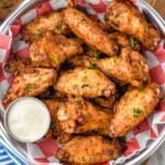 Overhead photo of Old Bay Chicken Wings served with homemade ranch dressing for dipping. - 11