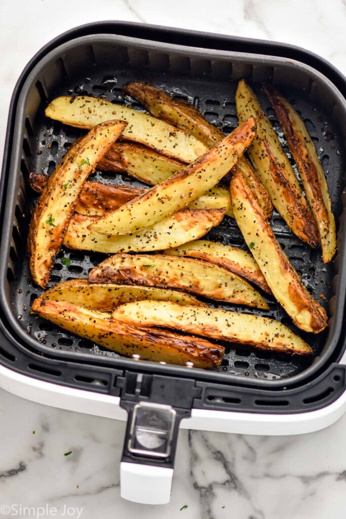 Overhead photo of Air Fryer Potato Wedges in air fryer basket