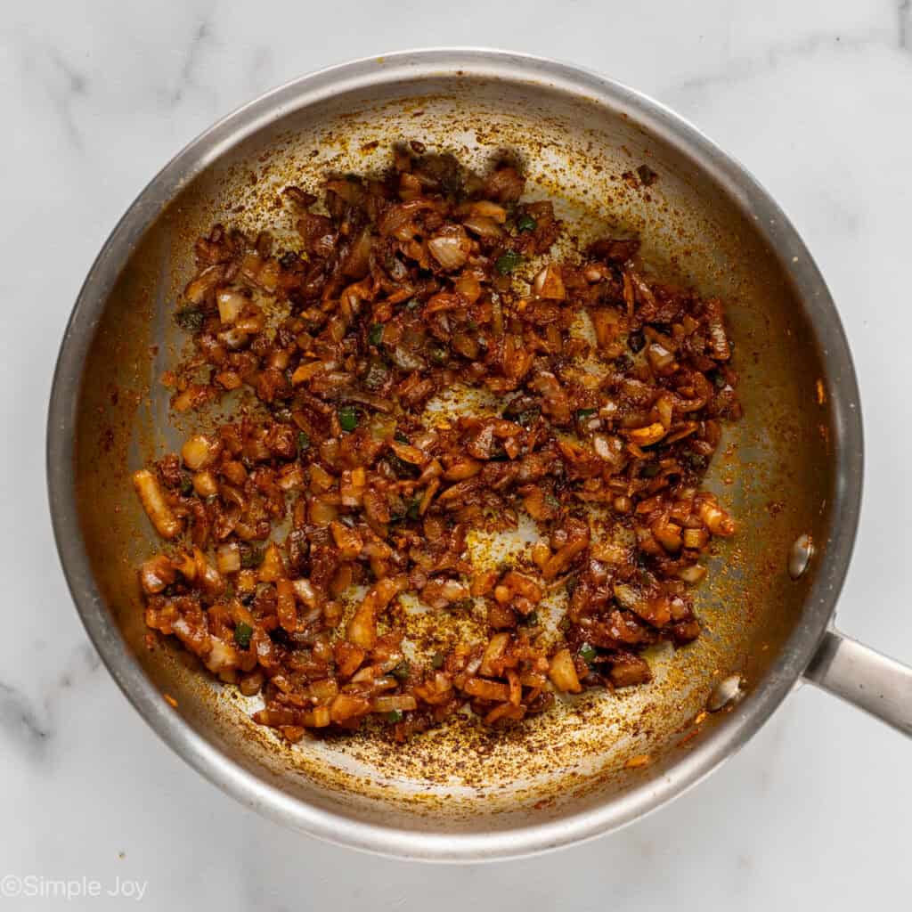 onion, garlic, jalapeno, and seasonings sauteed in a skillet
