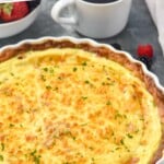 pinterest graphic of side view of a quiche Lorraine recipe in a fluted thin pie dish says "the best quiche Lorraine simplejoy.com"