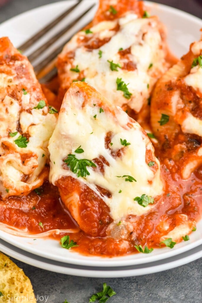 Close up photo of Stuffed Shells served on a plate.