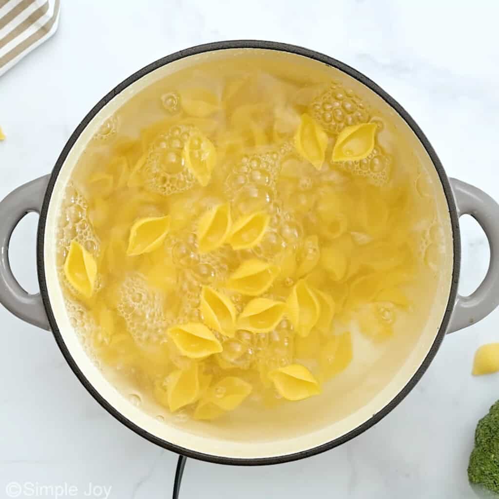 overhead of pasta in a pot boiling