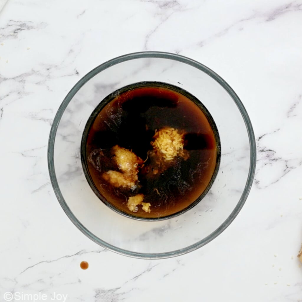 overhead of bowl of sauce to make teriyaki chicken bowls before mixing