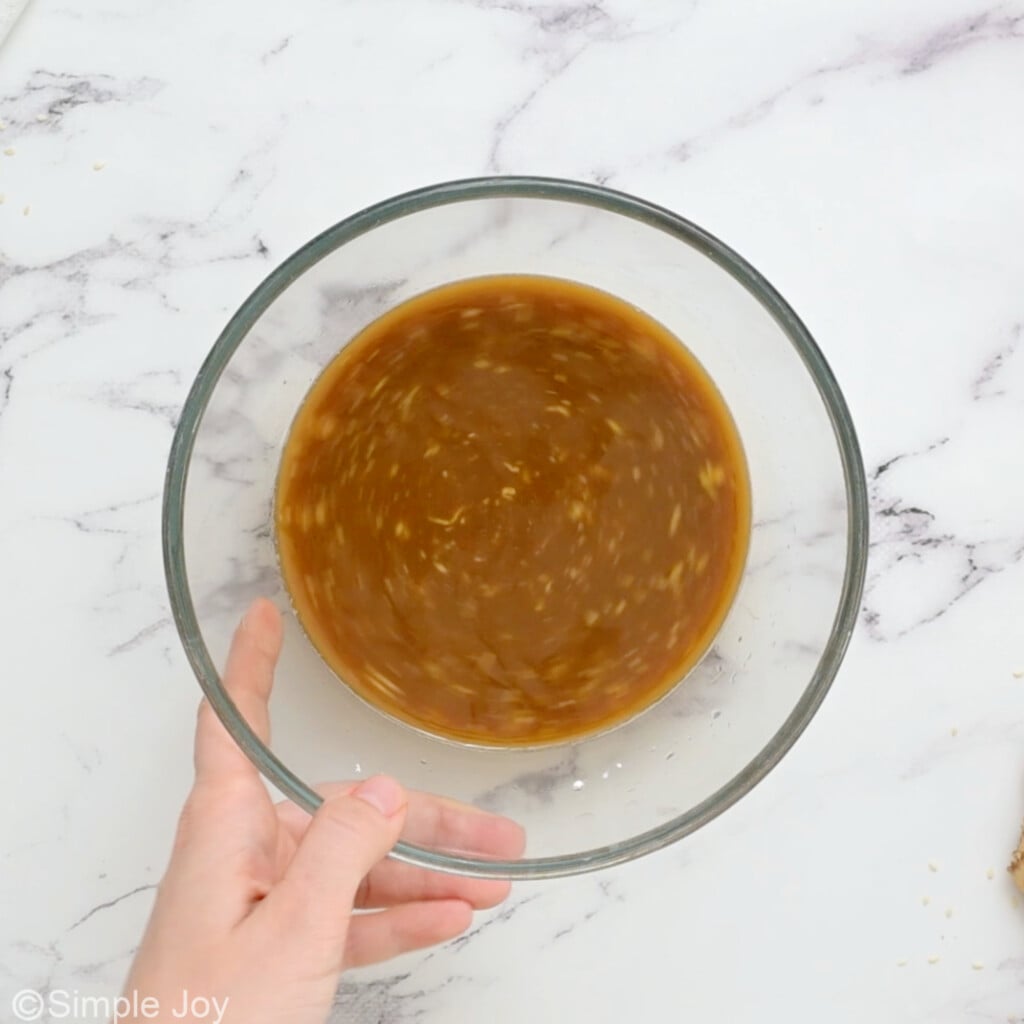 overhead of bowl of sauce to make teriyaki chicken bowls after mixing