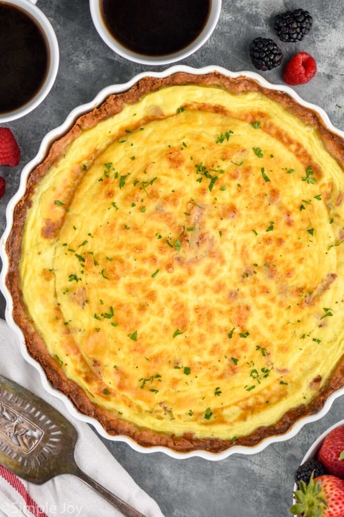 overhead of a quiche Lorraine in a fluted pie dish