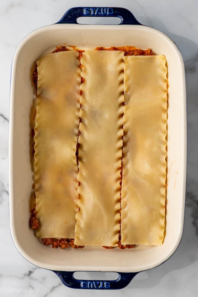overhead of a baking dish with lasagna noodles