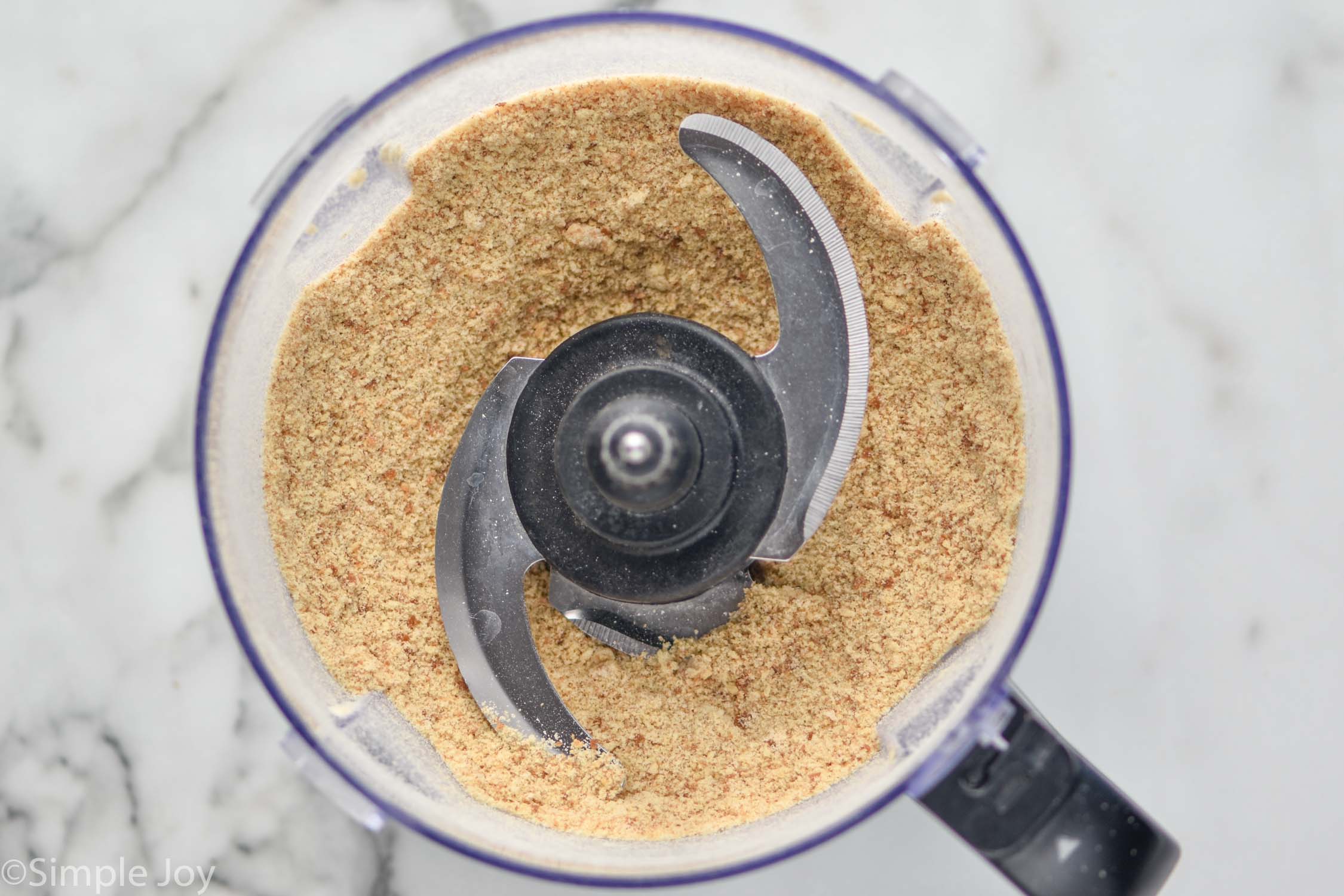 Overhead photo of a food processor with Breadcrumbs.