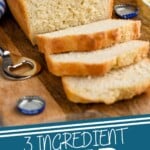 Pinterest graphic for Beer Bread recipe. Image is overhead photo of a partially sliced loaf of Beer Bread. Text says, "3 ingredient Beer Bread simplejoy.com"