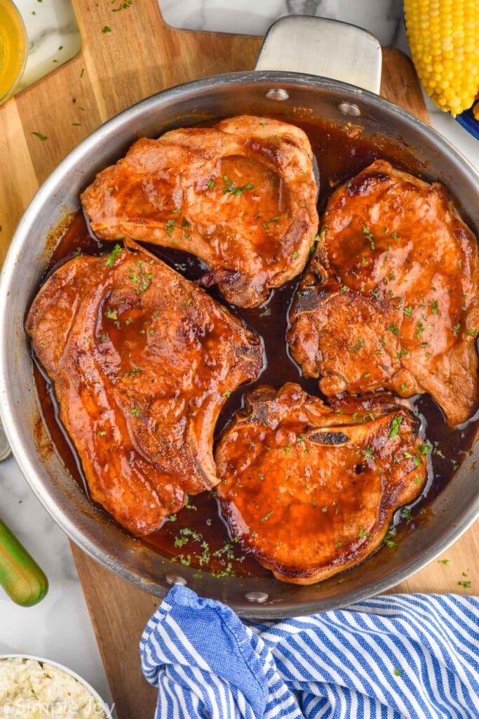 Overhead photo of a skillet of BBQ Pork Chops