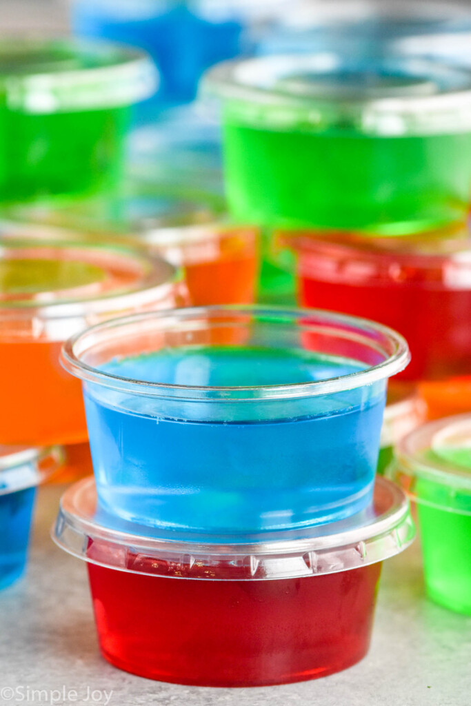Close up photo of Jello Shots stacked on top of each other
