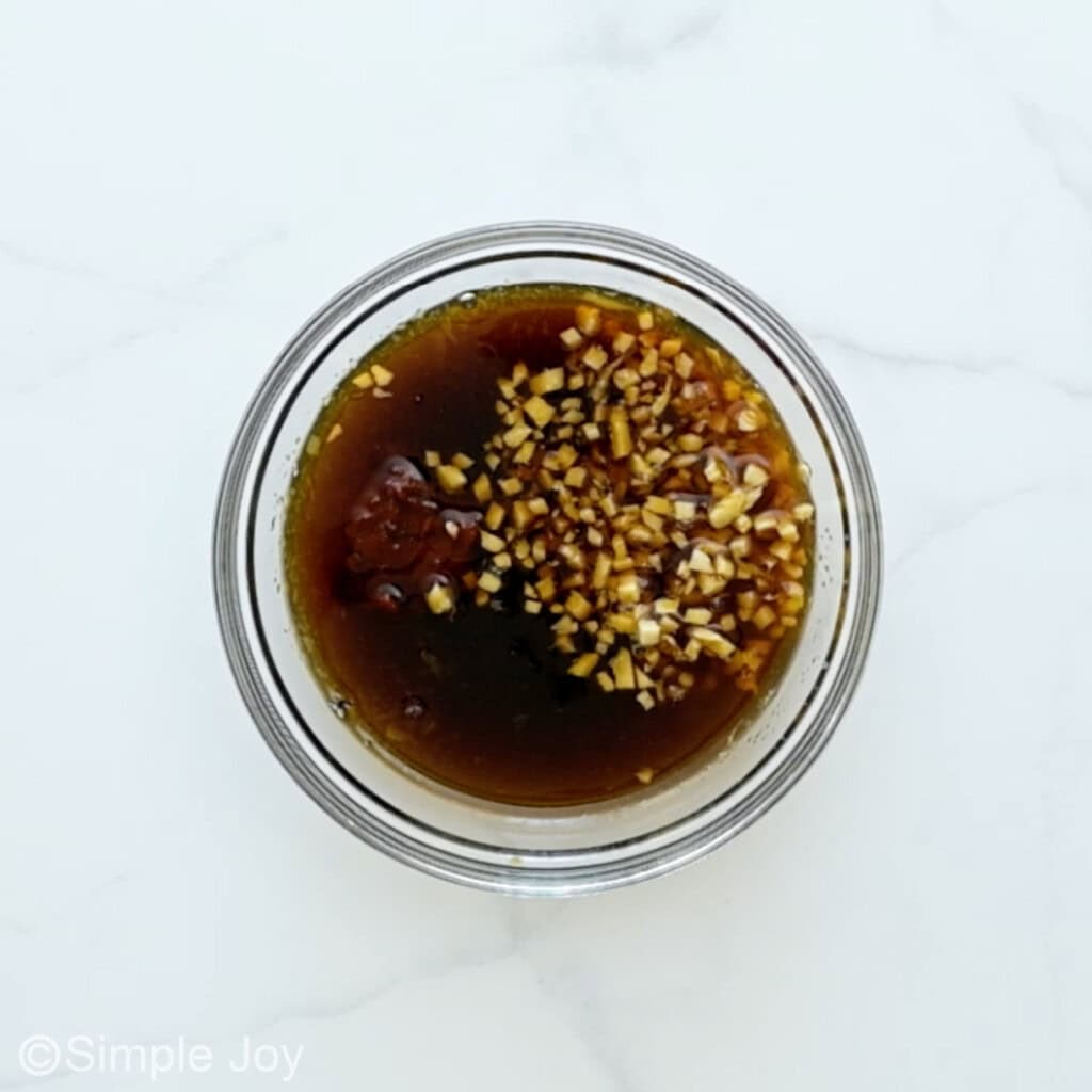 overhead of a bowl of sauce for pineapple chicken unmixed