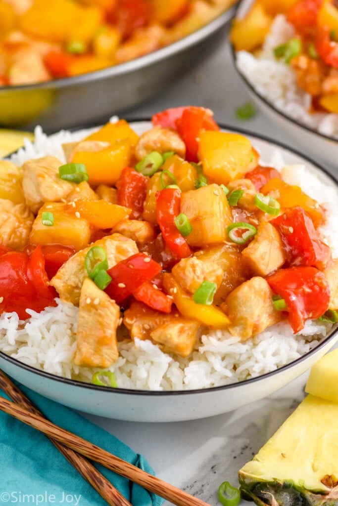 Overhead photo of Pineapple Chicken served in a bowl over rice.