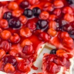 Pinterest graphic for no bake cherry cheesecake bars. Text says "no bake cheesecake bars simplejoy.com" Image shows cherry cheesecake bars with two slices cut, fresh cherries sitting beside.