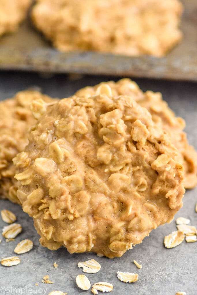 No Bake Biscoff Cookie with baking sheet of No Bake Biscoff Cookies sitting in background