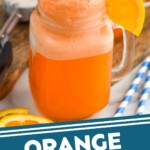 Pinterest graphic for Orange Creamsicle recipe. Image is side view of Orange Creamsicle served in a glass mug and garnished with orange slice and straws. Text says, "Orange Creamsicle cocktail simplejoy.com"