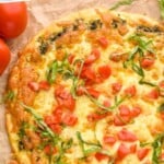 Pinterest graphic for Pesto Pizza recipe. Text says, "the best Pesto Pizza simplejoy.com." Image is overhead photo of Pesto Pizza.