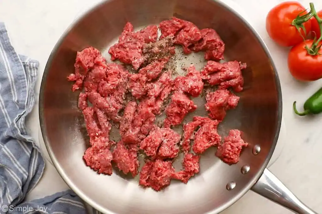 ground beef being browned in a skillet  - 8