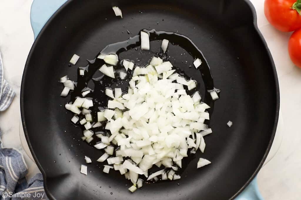 onions being sautéed in oil