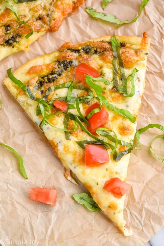 Overhead photo of a slice of Pesto Pizza