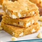 Pinterest graphic for Blondie Recipe. Image is side view of a stack of Blondie brownies. Text says, "The best Blondies simplejoy.com"