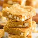 Side view of a stack of blondie brownies.