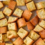 Pinterest graphic for Croutons recipe. Text says, "homemade crouton recipe simplejoy.com." Image is close up photo of Croutons.