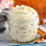 Pinterest graphic for maple frosting. Image shows a jar of maple frosting. Text says "maple frosting simplejoy.com"