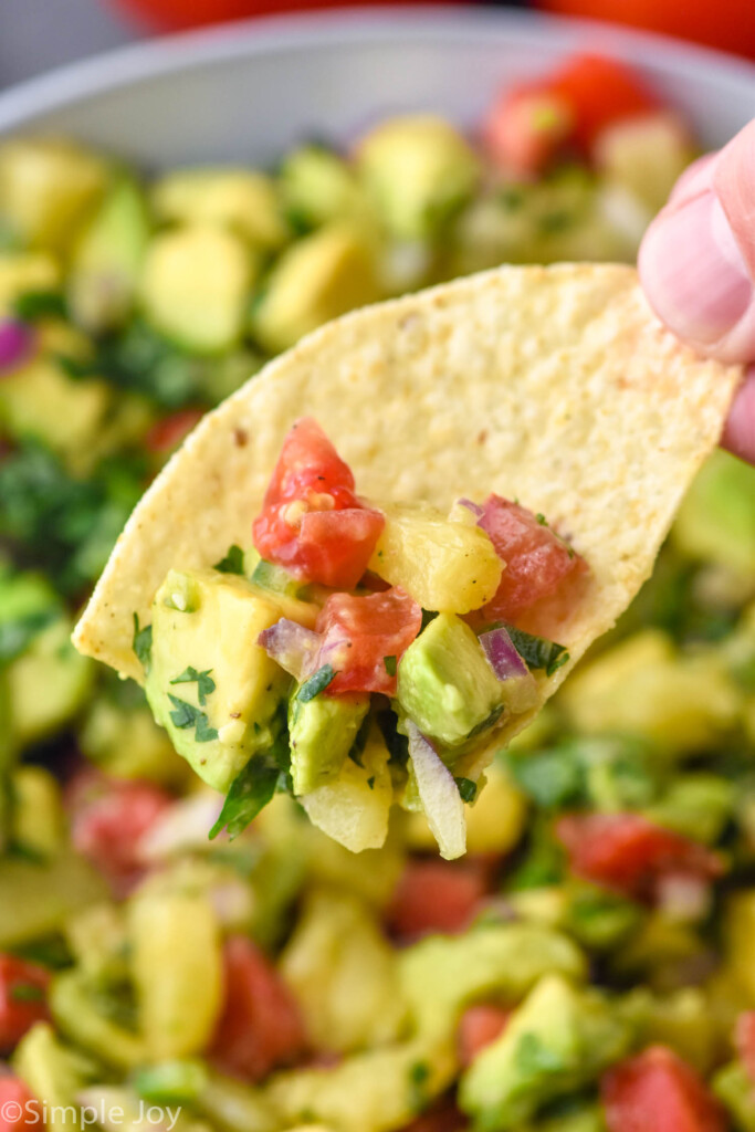 Close up photo of Avocado Salsa on a chip