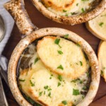Overhead photo of two bowls of French Onion Soup