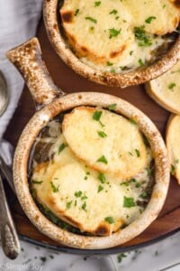 Overhead photo of two bowls of French Onion Soup