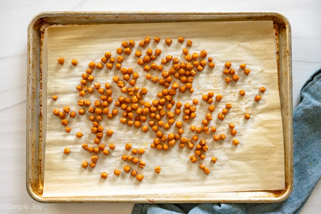 overhead of a pan with roasted chickpeas on it